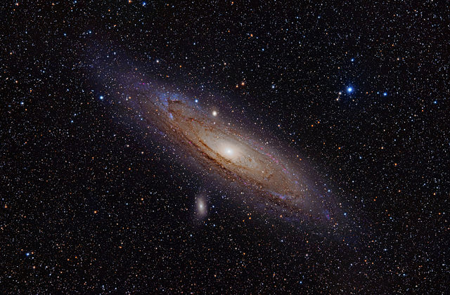 "Andromeda Galaxy (with h-alpha)" by Adam Evans - M31, the Andromeda Galaxy (now with h-alpha)Uploaded by NotFromUtrecht. Licensed under CC BY 2.0 via Commons - https://commons.wikimedia.org/wiki/File:Andromeda_Galaxy_(with_h-alpha).jpg#/media/File:Andromeda_Galaxy_(with_h-alpha).jpg